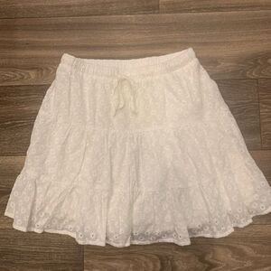 Blue Blush / Made with Love Eyelet mini skirt. Size: S. Lined. Has stretch.